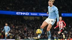 Manchester City's Norwegian striker #09 Erling Haaland controls the ball during the English Premier League football match between Manchester City and Brentford at the Etihad Stadium in Manchester, north west England, on February 20, 2024. (Photo by Paul ELLIS / AFP) / RESTRICTED TO EDITORIAL USE. No use with unauthorized audio, video, data, fixture lists, club/league logos or 'live' services. Online in-match use limited to 120 images. An additional 40 images may be used in extra time. No video emulation. Social media in-match use limited to 120 images. An additional 40 images may be used in extra time. No use in betting publications, games or single club/league/player publications. / 
