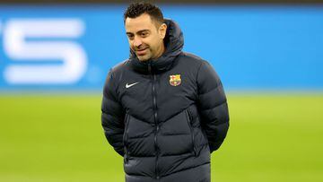 MUNICH, GERMANY - DECEMBER 07: Xavier Hern&aacute;ndez i Creus, head coach of FC Barcelona looks on during a FC Barcelona training session at Allianz Arena on December 07, 2021 in Munich, Germany. (Photo by Alexander Hassenstein/Getty Images)