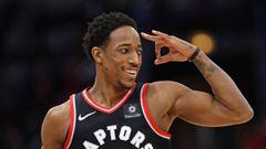 CHICAGO, IL - JANUARY 03: DeMar DeRozan #10 of the Toronto Raptors signals to teammates after hitting a three point shot on his way to a game-high 35 points against the Chicago Bulls at the United Center on January 3, 2018 in Chicago, Illinois. The Raptors defeated the Bulls 124-115. NOTE TO USER: User expressly acknowledges and agrees that, by downloading and or using this photograph, User is consenting to the terms and conditions of the Getty Images License Agreement.   Jonathan Daniel/Getty Images/AFP == FOR NEWSPAPERS, INTERNET, TELCOS &amp; TELEVISION USE ONLY ==