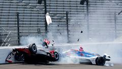 May 22, 2023; Speedway, Indiana, USA;Rahal Letterman Lanigan Racing driver Katherine Legge (44) and Dreyer & Reinbold Racing driver Stefan Wilson (24) crash in the first turn Monday, May 22, 2023, during practice ahead of the 107th running of the Indianapolis 500 at Indianapolis Motor Speedway. Mandatory Credit: John Chilton-USA TODAY Sports