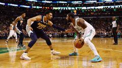 BOSTON, MA - DECEMBER 13: Kyrie Irving #11 of the Boston Celtics handles the ball against Jamal Murray #27 of the Denver Nuggets during the second half at TD Garden on December 13, 2017 in Boston, Massachusetts.   Tim Bradbury/Getty Images/AFP == FOR NEW