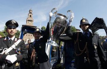 The Champions League trophy is on display in central Milan
