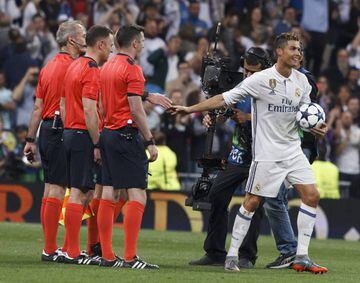 Cristiano takes away the match ball after his Champions League hat-trick.
