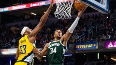 Jan 27, 2023; Indianapolis, Indiana, USA; Milwaukee Bucks forward Giannis Antetokounmpo (34) shoots the ball while Indiana Pacers center Myles Turner (33) defends in the second half at Gainbridge Fieldhouse. Mandatory Credit: Trevor Ruszkowski-USA TODAY Sports