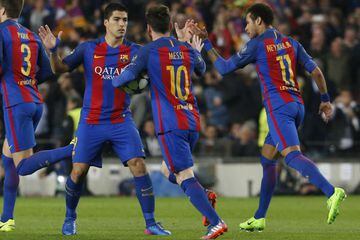 Messi (centre) celebrates wuth Luis Suárez (left) and Neymar during Barcelona's famous Champions League comeback against Paris Saint-Germain in 2017. The Catalan giants must pull off a similar feat if they are to knock PSG out of this season's competition