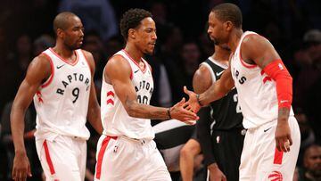 Jan 8, 2018; Brooklyn, NY, USA; Toronto Raptors shooting guard DeMar DeRozan (10) reacts with small forward CJ Miles (0) after hitting the game tying shot against the Brooklyn Nets during overtime at Barclays Center. Mandatory Credit: Brad Penner-USA TODA