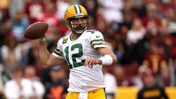 LANDOVER, MARYLAND - OCTOBER 23: Aaron Rodgers #12 of the Green Bay Packers attempts a pass during the third quarter of the game against the Washington Commanders at FedExField on October 23, 2022 in Landover, Maryland. (Photo by Scott Taetsch/Getty Images)
