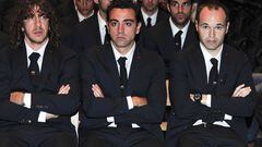 Puyol, Xavi e Iniesta.
