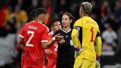 MAINZ, GERMANY - MARCH 25: Referee Maria Ferrieri Caputi speaks to Luis Abram and Pedro Gallese of Peru during the international friendly match between Germany and Peru at MEWA Arena on March 25, 2023 in Mainz, Germany. (Photo by Will Palmer/Sportsphoto/Allstar via Getty Images)