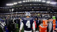 ARLINGTON, TEXAS - DECEMBER 30: Dak Prescott #4 of the Dallas Cowboys walks off the field after defeating the Detroit Lions in the game at AT&T Stadium on December 30, 2023 in Arlington, Texas.   Ron Jenkins/Getty Images/AFP (Photo by Ron Jenkins / GETTY IMAGES NORTH AMERICA / Getty Images via AFP)