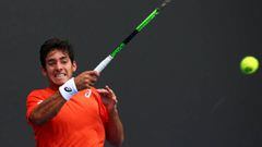 MELBOURNE, AUSTRALIA - JANUARY 15: Christian Garin of Chile plays a forehand in his first round match against David Goffin of Belgium during day two of the 2019 Australian Open at Melbourne Park on January 15, 2019 in Melbourne, Australia.  (Photo by Mike