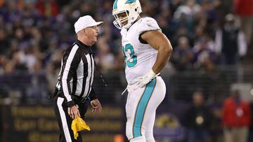 BALTIMORE, MD - OCTOBER 26: Defensive Tackle Ndamukong Suh #93 of the Miami Dolphins talks with referee John Parry after a play in the third quarter against the Baltimore Ravens at M&amp;T Bank Stadium on October 26, 2017 in Baltimore, Maryland.   Rob Carr/Getty Images/AFP == FOR NEWSPAPERS, INTERNET, TELCOS &amp; TELEVISION USE ONLY ==