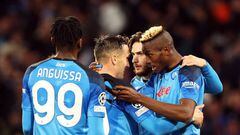 15 March 2023, Italy, Neapel: Soccer: Champions League, SSC Napoli - Eintracht Frankfurt, knockout round, round of 16, second leg, Stadio Diego Armando Maradona. Napoli's Victor Osimhen (r) celebrates with teammate Piotr Zielinski (M) after scoring the 1:0 goal. Photo: Oliver Weiken/dpa (Photo by Oliver Weiken/picture alliance via Getty Images)