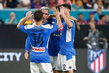 Napoli's Jose Callejon (2nd L) celebrates his goal with teammates against Napoli during the International Champions Cup football match between FC Barcelona and SSC Napoli at Hard Rock Stadium in Miami, Florida, on August 7, 2019. (Photo by RHONA WISE / AF