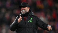 Liverpool's German manager Jurgen Klopp celebrates on the pitch after the English FA Cup fifth round football match between Liverpool and Southampton at Anfield stadium, in Liverpool, north west England, on February 28, 2024. Liverpool won the game 3-0. (Photo by Paul ELLIS / AFP) / RESTRICTED TO EDITORIAL USE. No use with unauthorized audio, video, data, fixture lists, club/league logos or 'live' services. Online in-match use limited to 120 images. An additional 40 images may be used in extra time. No video emulation. Social media in-match use limited to 120 images. An additional 40 images may be used in extra time. No use in betting publications, games or single club/league/player publications. / 