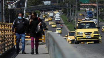Taxis run on an avenue during "No Car Day" in Bogota, Colombia February 2, 2023. REUTERS/Luisa Gonzalez