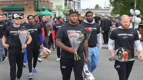 The Buffalo Bills took to the streets on Wednesday to show their support for the community that is now in mourning after Saturday's racist mass shooting.