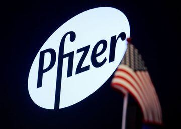 Positive vibes | a logo for Pfizer is displayed on a monitor on the floor at the New York Stock Exchange.