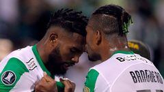 Atletico Nacional's defender Cristian Devenish (L) celebrates after scoring a goal during the Copa Libertadores group stage first leg football match between Atletico Nacional and Olimpia, at the Atanasio Girardot stadium in Medellin, Colombia, on May 2, 2023. (Photo by Fredy BUILES / AFP)