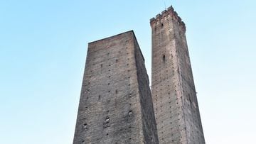 A general view of the medieval Garisenda tower, also known as the "leaning tower", and the Asinelli tower in Bologna, Italy, December 3, 2023. REUTERS / Jennifer Lorenzini