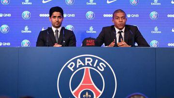 Nasser Al-Khelaifi and Kylian Mbappé attend a PSG press conference.