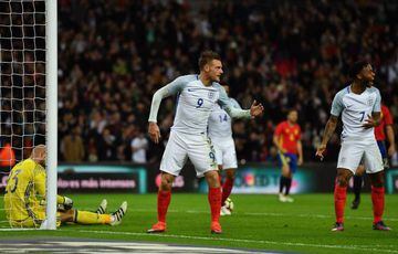Jamie Vardy and Raheem Sterling strike a still pose after the Leicester man puts England 2-0 ahead against Spain.
