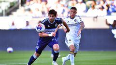 Jul 30, 2023; Carson, CA, USA; Vancouver Whitecaps forward Brian White (24) moves the ball against Los Angeles Galaxy defender Calegari (2) during the first half at Dignity Health Sports Park. Mandatory Credit: Gary A. Vasquez-USA TODAY Sports