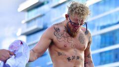 TAMPA, FLORIDA - DECEMBER 15: Jake Paul works out during a media workout at the Seminole Hard Rock Tampa pool prior to his December 18th fight against Tyron Woodley on December 15, 2021 in Tampa, Florida.   Julio Aguilar/Getty Images/AFP == FOR NEWSPAPER