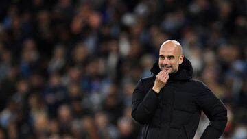 Manchester City's Spanish manager Pep Guardiola reacts during the UEFA Champions League semi-final first leg football match between Manchester City and Real Madrid, at the Etihad Stadium, in Manchester, on April 26, 2022. (Photo by Oli SCARFF / AFP)