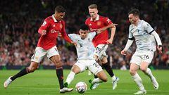 MANCHESTER, ENGLAND - AUGUST 22: Raphael Varane of Manchester United battles for possession with Luis Diaz of Liverpool during the Premier League match between Manchester United and Liverpool FC at Old Trafford on August 22, 2022 in Manchester, England. (Photo by Michael Regan/Getty Images)