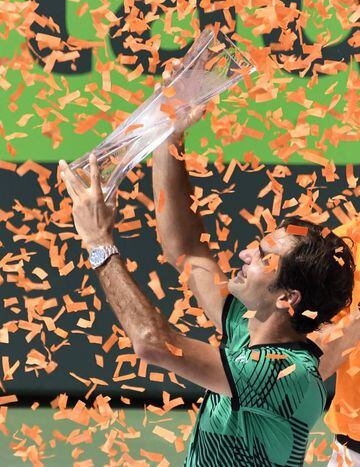 Roger Federer of Switzerland holds his trophy aloft in what is proving to be an excellent return to form.