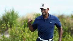 NASSAU, BAHAMAS - DECEMBER 02: Tiger Woods of the United States celebrates a birdie putt on the 16th green during round two of the Hero World Challenge at Albany, The Bahamas on December 2, 2016 in Nassau, Bahamas.   Christian Petersen/Getty Images/AFP == FOR NEWSPAPERS, INTERNET, TELCOS &amp; TELEVISION USE ONLY ==