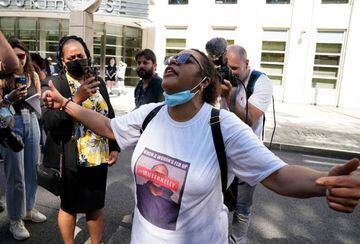 R&B singer R. Kelly's supporter reacts following the sentencing.
