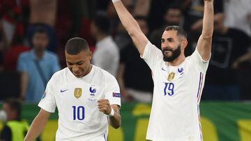 BUDAPEST, HUNGARY - JUNE 23: Karim Benzema of France celebrates with teammate Kylian Mbappe after scoring their side&#039;s second goal during the UEFA Euro 2020 Championship Group F match between Portugal and France at Puskas Arena on June 23, 2021 in Bu