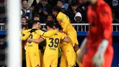 Barcelona players celebrate their second goal scored by Barcelona's German midfielder #22 Ilkay Gundogan during the Spanish league football match between Deportivo Alaves and FC Barcelona at the Mendizorroza stadium in Vitoria on February 3, 2024. (Photo by Ander Gillenea / AFP)