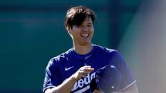 GLENDALE, ARIZONA - FEBRUARY 14: Shohei Ohtani #17 of the Los Angeles Dodgers laughs during workouts at Camelback Ranch on February 14, 2024 in Glendale, Arizona.   Chris Coduto/Getty Images/AFP (Photo by Chris Coduto / GETTY IMAGES NORTH AMERICA / Getty Images via AFP)