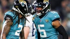 JACKSONVILLE, FLORIDA - JANUARY 07: Rayshawn Jenkins #2 of the Jacksonville Jaguars and Andre Cisco #5 of the Jacksonville Jaguars react after a defensive play during the second quarter against the Tennessee Titans at TIAA Bank Field on January 07, 2023 in Jacksonville, Florida.   Courtney Culbreath/Getty Images/AFP (Photo by Courtney Culbreath / GETTY IMAGES NORTH AMERICA / Getty Images via AFP)