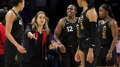 LAS VEGAS, NEVADA - AUGUST 20: (L-R) Kiah Stokes #41, head coach Becky Hammon, Chelsea Gray #12, A'ja Wilson #22 and Jackie Young #0 of the Las Vegas Aces talk on the court in the second quarter of Game Two of the 2022 WNBA Playoffs first round against the Phoenix Mercury at Michelob ULTRA Arena on August 20, 2022 in Las Vegas, Nevada. The Aces defeated the Mercury 117-80 to win the series. NOTE TO USER: User expressly acknowledges and agrees that, by downloading and or using this photograph, User is consenting to the terms and conditions of the Getty Images License Agreement.   Ethan Miller/Getty Images/AFP
== FOR NEWSPAPERS, INTERNET, TELCOS & TELEVISION USE ONLY ==