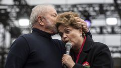 Dilma Roussef, right, and Luiz Incio Lula da Silva, Brazil's former presidents, embrace during a campaign event at Vale do Anhangabau in Sao Paulo, Brazil, on Saturday, Aug. 20, 2022. Datafolha election poll released on Thursday showed incumbent President Jair Bolsonaro narrowing the gap to front-runner Lula to 15 percentage points from 18 points in July and 21 points in May. Photographer: Victor Moriyama/Bloomberg