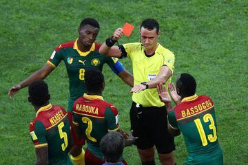 Emest Mabouka is shown a red card by referee Wilmar Roldan after advice from the VAR during Cameroon's Confederations Cup Russia match against Germany.