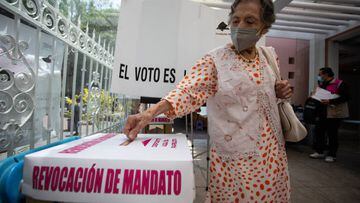 MEXICO CITY, MEXICO -  APRIL 10: A woman casts her ballot at a polling station during a national referendum on whether Mexico's President Andres Manuel Lopez Obrador should end his six-year term or continue, in Mexico City, Mexico on April 10, 2022. (Photo by Daniel Cardenas/Anadolu Agency via Getty Images)
