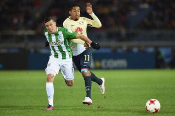 YOKOHAMA, JAPAN - DECEMBER 18:  Mateus Uribe of Atletico Nacional competes for the ball against Michael Arroyo of Club America during the FIFA Club World Cup 3rd place match between Club America and Atletico Nacional at International Stadium Yokohama on December 18, 2016 in Yokohama, Japan.  (Photo by Matt Roberts/Getty Images)