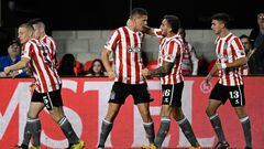 Estudiantes de La Plata's forward Guido Carrillo (C) celebrates with his teammates after scoring a goal during the Copa Sudamericana round of 16 first leg football match between Argentina's Estudiantes de la Plata and Brazil's Goias at the Jorge Luis Hirschi stadium in La Plata, Argentina, on August 2, 2023. (Photo by Luis ROBAYO / AFP)