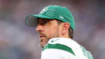 EAST RUTHERFORD, NEW JERSEY - AUGUST 26: Aaron Rodgers #8 of the New York Jets looks on from the sideline during the game against the New York Giants at MetLife Stadium on August 26, 2023 in East Rutherford, New Jersey.   Mike Stobe/Getty Images/AFP (Photo by Mike Stobe / GETTY IMAGES NORTH AMERICA / Getty Images via AFP)