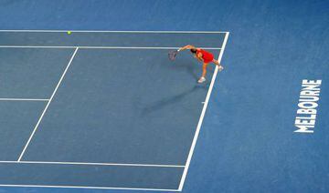 Simona Halep serves to Caroline Wozniacki in today's women's singles final at the Australian Open.