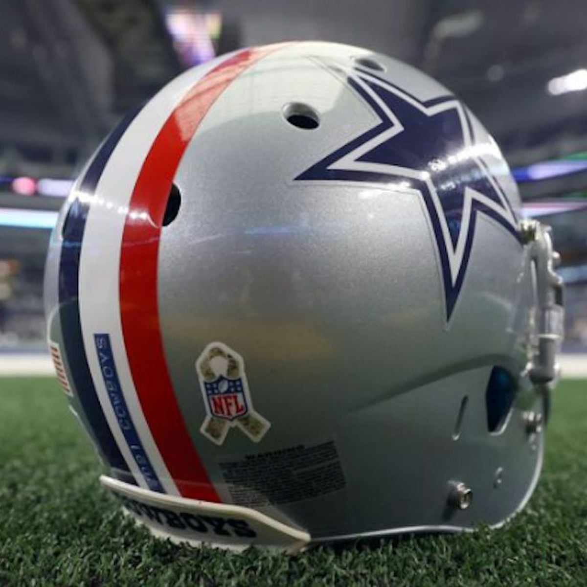 Why are Dallas Cowboys wearing red stripe on helmet vs. Broncos?