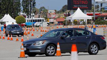FILE PHOTO: A drive-through testing center is shown in operation during an outbreak of the coronavirus disease (COVID-19) in Inglewood, California, U.S., July 20, 2020. REUTERS/Mike Blake/File Photo