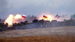 Polish PT-91 Twardy, German Leopard 2 and Italian Ariete tanks of NATO Enhanced Forward Presence battle groups attend live fire exercise, during Iron Spear 2022 military drill in Adazi, Latvia November 15, 2022. REUTERS/Ints Kalnins     TPX IMAGES OF THE DAY