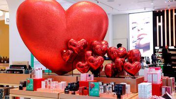 PARIS, FRANCE - FEBRUARY 13: Red hearts are displayed at the entrance of the Printemps Haussmann department store on the eve of Valentine's Day on February 13, 2023 in Paris, France. Valentine's Day is known as the feast of lovers and the celebration of love and romance in many parts of the world and takes place on February 14 each year. (Photo by Chesnot/Getty Images)