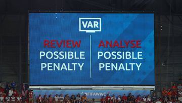 LYON, FRANCE - JULY 07:  The big screen shows information during a VAR penalty review during the 2019 FIFA Women&#039;s World Cup France Final match between The United States of America and The Netherlands at Stade de Lyon on July 07, 2019 in Lyon, France